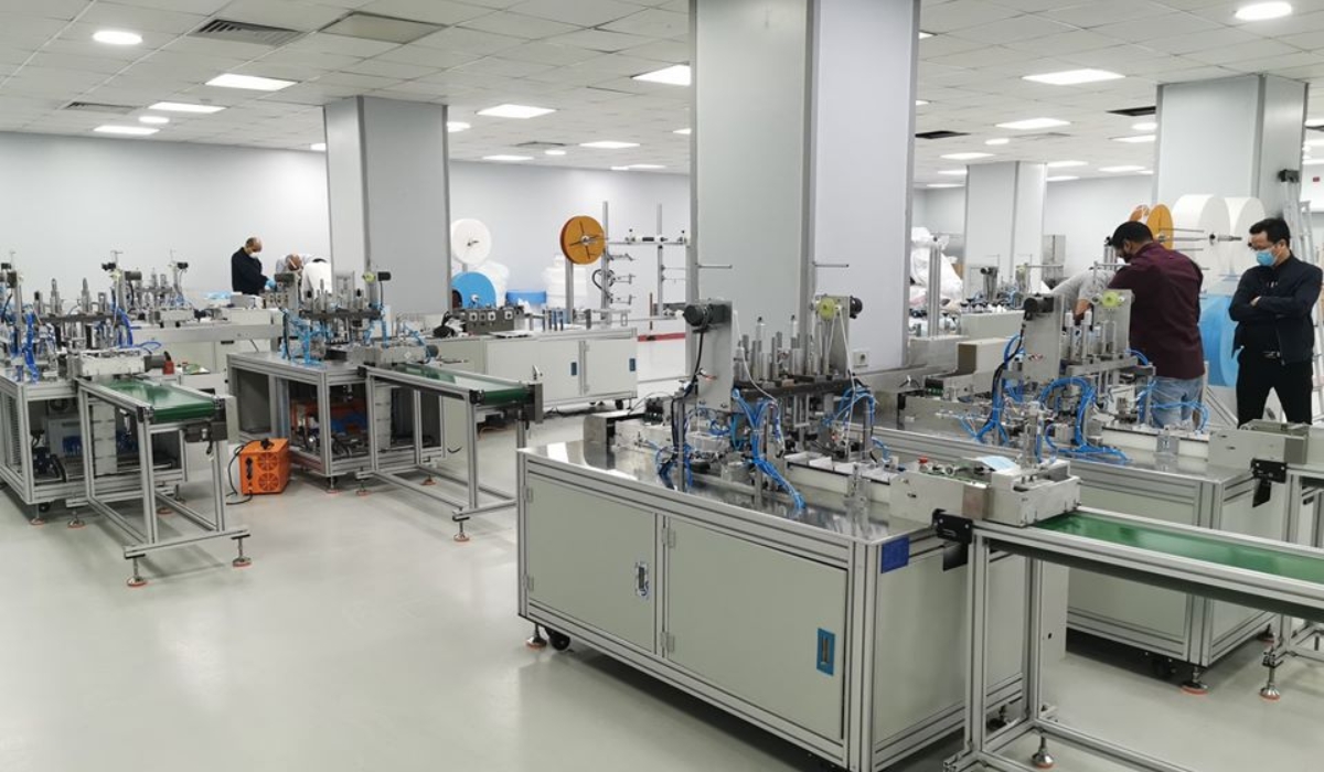 Exterior view of Al-Ettihad Medical Industries Factory in Obour showing industrial facility and security management