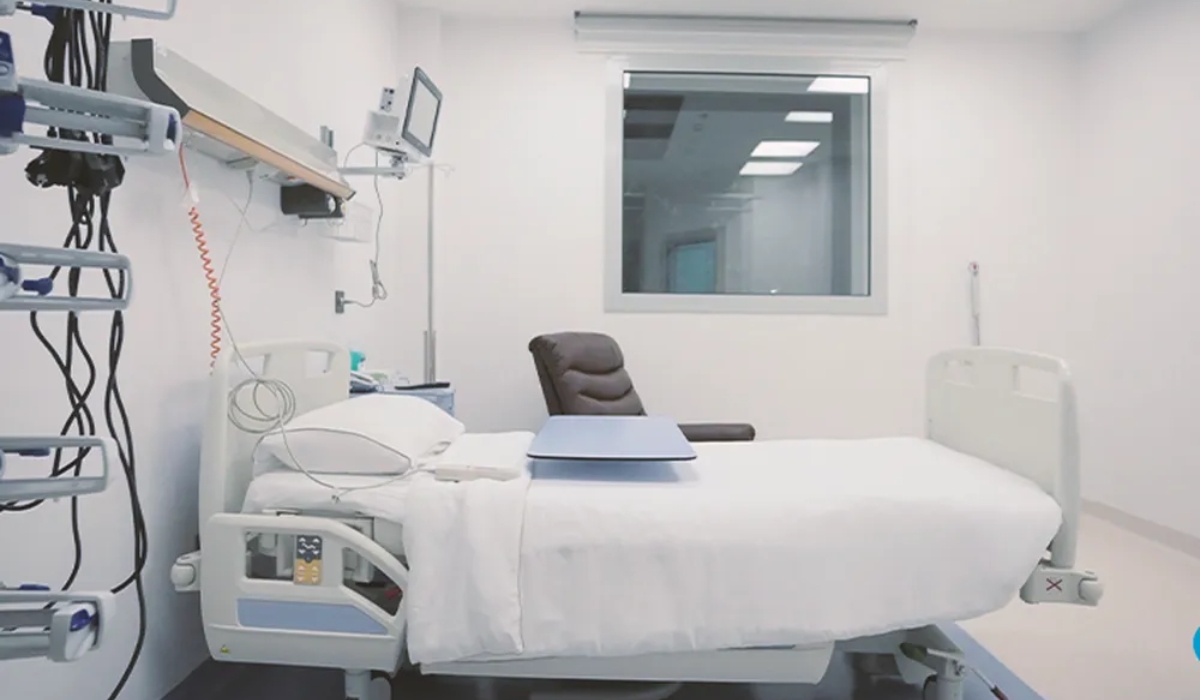 Technicians performing maintenance on central air conditioning and ventilation systems at Al-Qasr Al-Ainy New Teaching Hospital