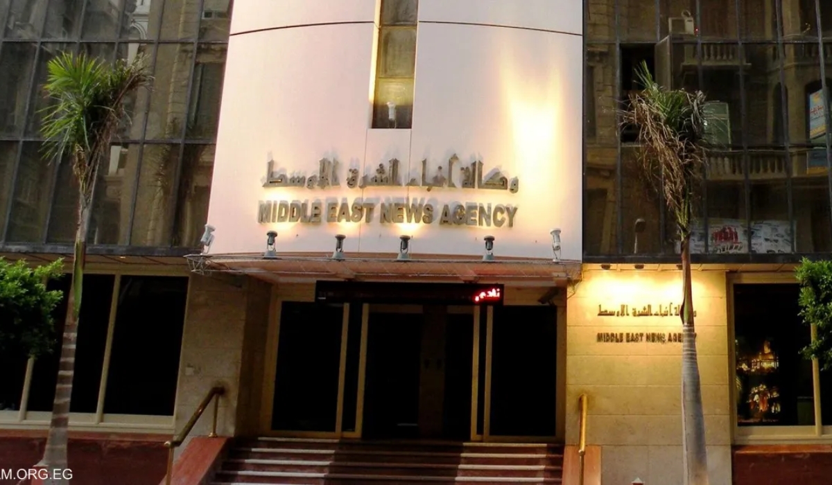 Technicians performing maintenance on electromechanical systems at the Middle East News Agency Building, ensuring smooth building operations